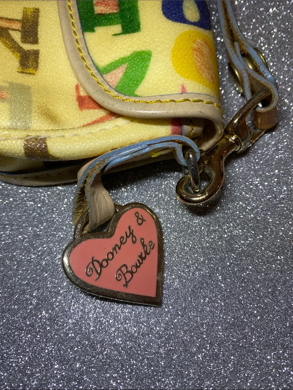 Dooney & Bourke Cream Canvas/Leather Logo Print Pattern Wristlet